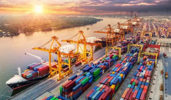 Logistics And Transportation Of Container Cargo Ship And Cargo Plane With Working Crane Bridge In Shipyard At Sunrise, Logistic Import Export And Transport Industry Background