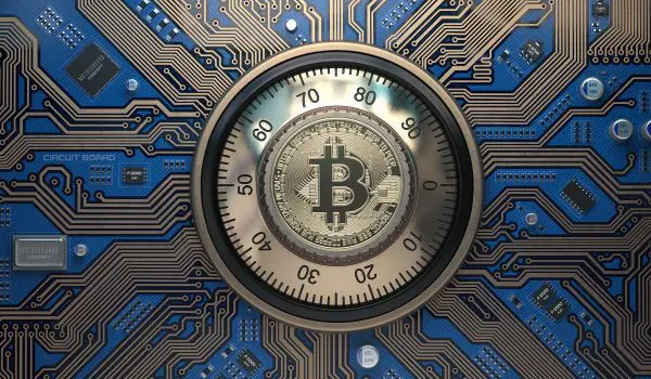 Bitcoin Cryptocurrency Security And Mining Concept. Safe Lock With Symbol Of Bitcoin On Circuit Board.