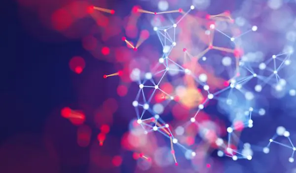 Abstract representation of a digital network with interconnected nodes and lines in hues of red, blue, and purple.
