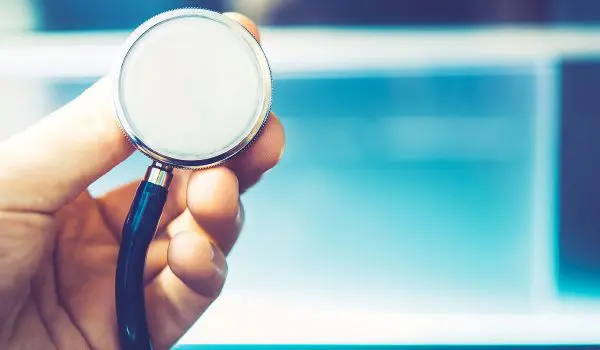 Hand Holding Stethoscope