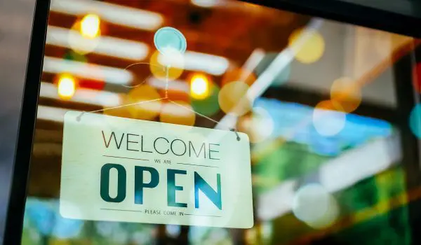 Franchise restaurant sign: "Open. Please Come In"