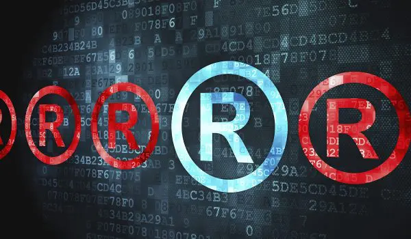 The graphic displays a digital backdrop overlaid with multiple bright red and blue circles marked with the letter "R" to possibly represent a data, coding, or software concept related to the R programming language.