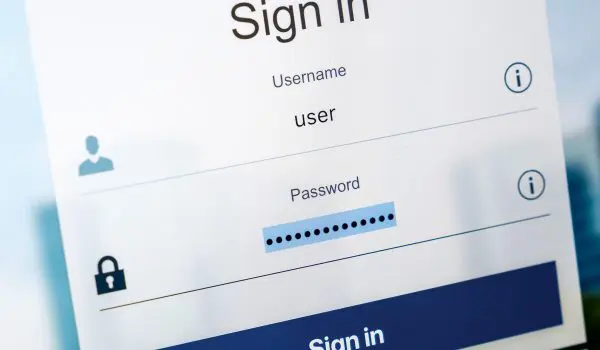 A login interface on a screen displaying fields for username and password with a "Sign in" button.