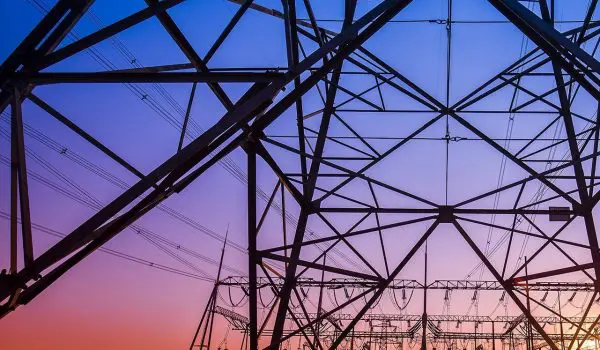 The Silhouette Of The Evening Electricity Transmission Pylon