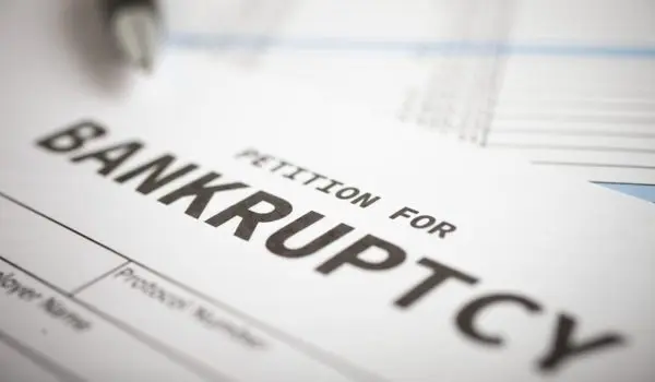 A bankruptcy petition form is being filled out.