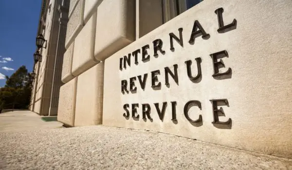 The front facade of a building displays a sign reading "Internal Revenue Service."