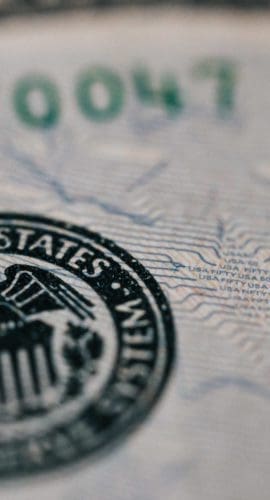 Symbol of eagle with shield on dollar banknote