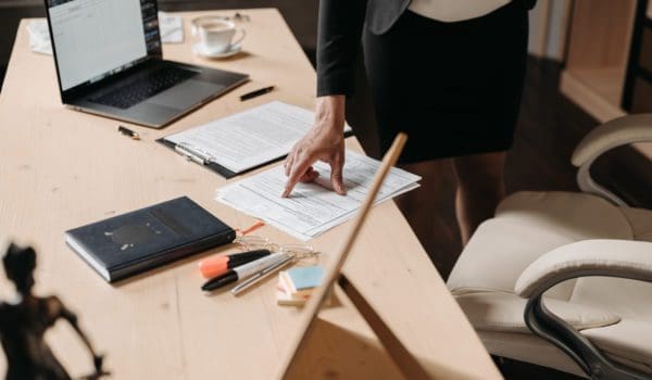 Professional person pointing on a contract