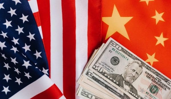American and chinese flags and usa dollars