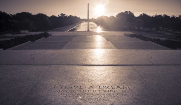 Washington D.C., USA - September 23, 2012: Martin Luther King quote inscription on the steps of the Lincoln Memorial on The National Mall.  "I Have a Dream" was a public speech delivered by American civil rights activist Martin Luther King Jr. on August 28, 1963, in which he calls for an end to racism in the United States. Delivered to over 250,000 civil rights supporters from the steps of the Lincoln Memorial during the March on Washington, the speech was a defining moment of the American Civil Rights Movement.