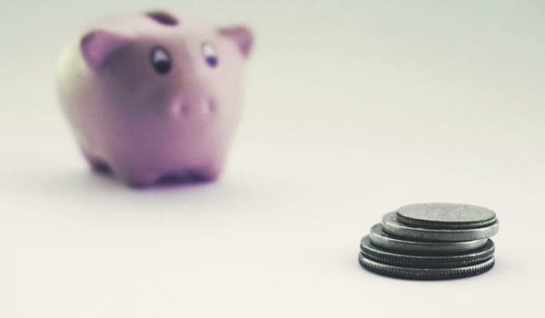Coins and a piggy bank