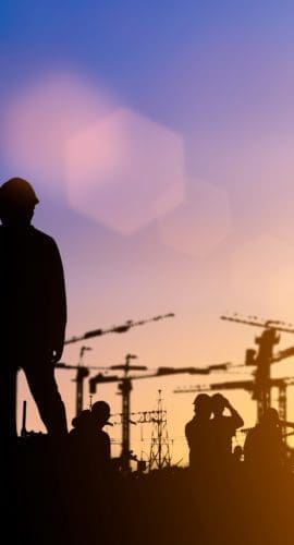 Silhouette of engineer and construction team working at site over blurred background for industry background with Light fair.Create from multiple reference images together