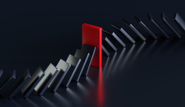 Row of Falling Domino Stones Stopped by Red Domino Stone Over Black Background, Risk Management, Intervene or Prevention Concept, 3d Rendering