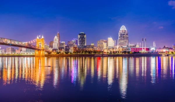 Cincinnati, Ohio, USA skyline on the river at dusk.