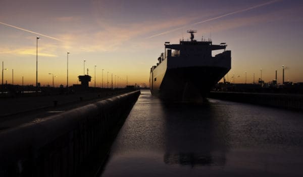 cargo ship mooring in lock