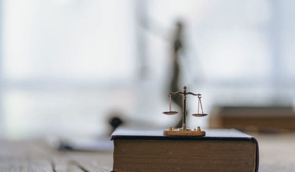 Judge's hammer, scales, god of justice Law in the Lawyer's Office