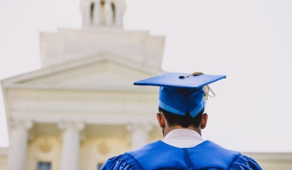 Rearview shot of a young man on graduation