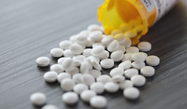 white pills spilled on table
