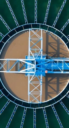 Aerial Top View of Drinking water treatment plant. Microbiology of drinking water production and distribution, water treatment plant. Microbiology of drinking water production. Morning scene,