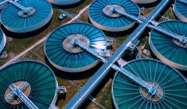 Aerial View of Drinking water treatment plant. Microbiology of drinking water production and distribution, water treatment plant. Microbiology of drinking water production. Morning scene.