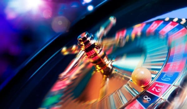 high contrast image of casino roulette in motion