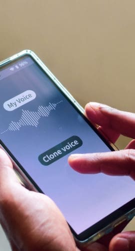 Man using mobile applications for cloning his voice. Selective focus.