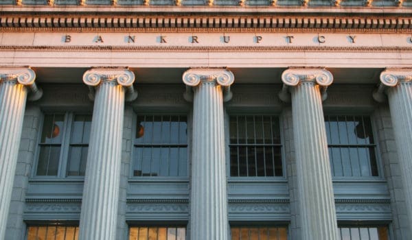 Bankruptcy Court. Dayton, Ohio. Greek Revival Architecture. The word BANKRUPTCY is visible just above the columns.