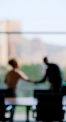 Business people, blur or shaking hands for deal, b2b collaboration or teamwork in office. Handshake, partnership or employee in corporate agreement with meeting success, welcome or thank you gesture