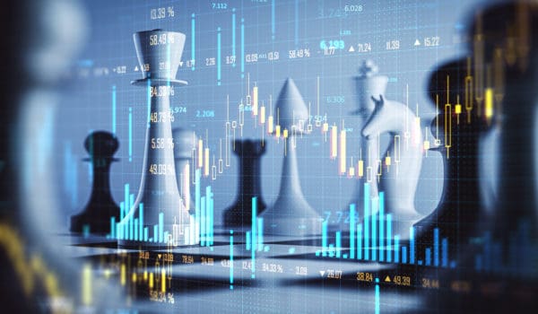 A blend of chess pieces and financial charts, showcasing strategy in trading on a blue background