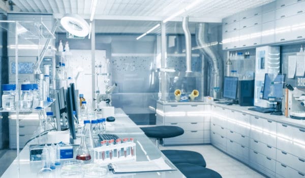 Bright and Ultra Modern High Tech Laboratory Full of Advanced Technological Wonders, Computers, Analyzing Machines, Test Tubes and Beakers.