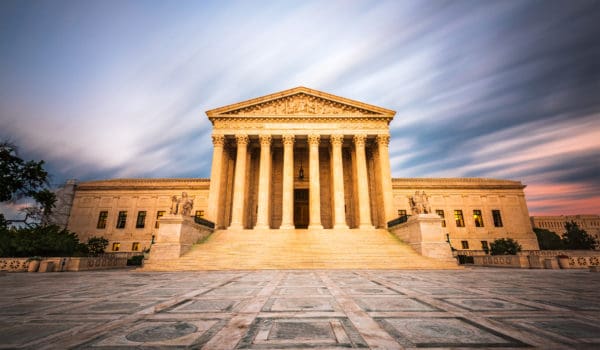 United States Supreme Court Building in Washington DC, USA at dusk.
